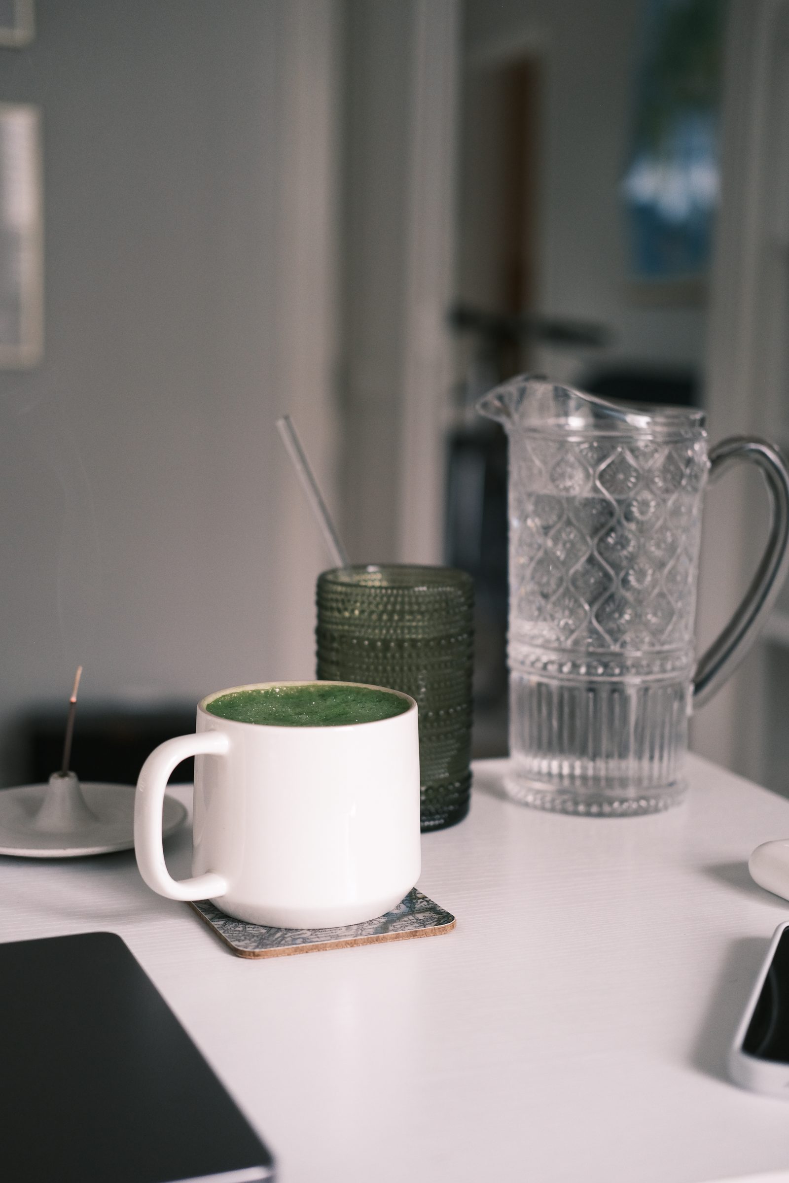 Matcha latte in a white mug